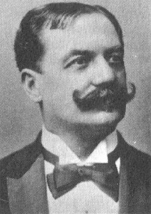 کارل میشائل زیرر (Karl Michael Ziehrer) در حال پوشیدن پاپیون به سبک قرن نوزدهم